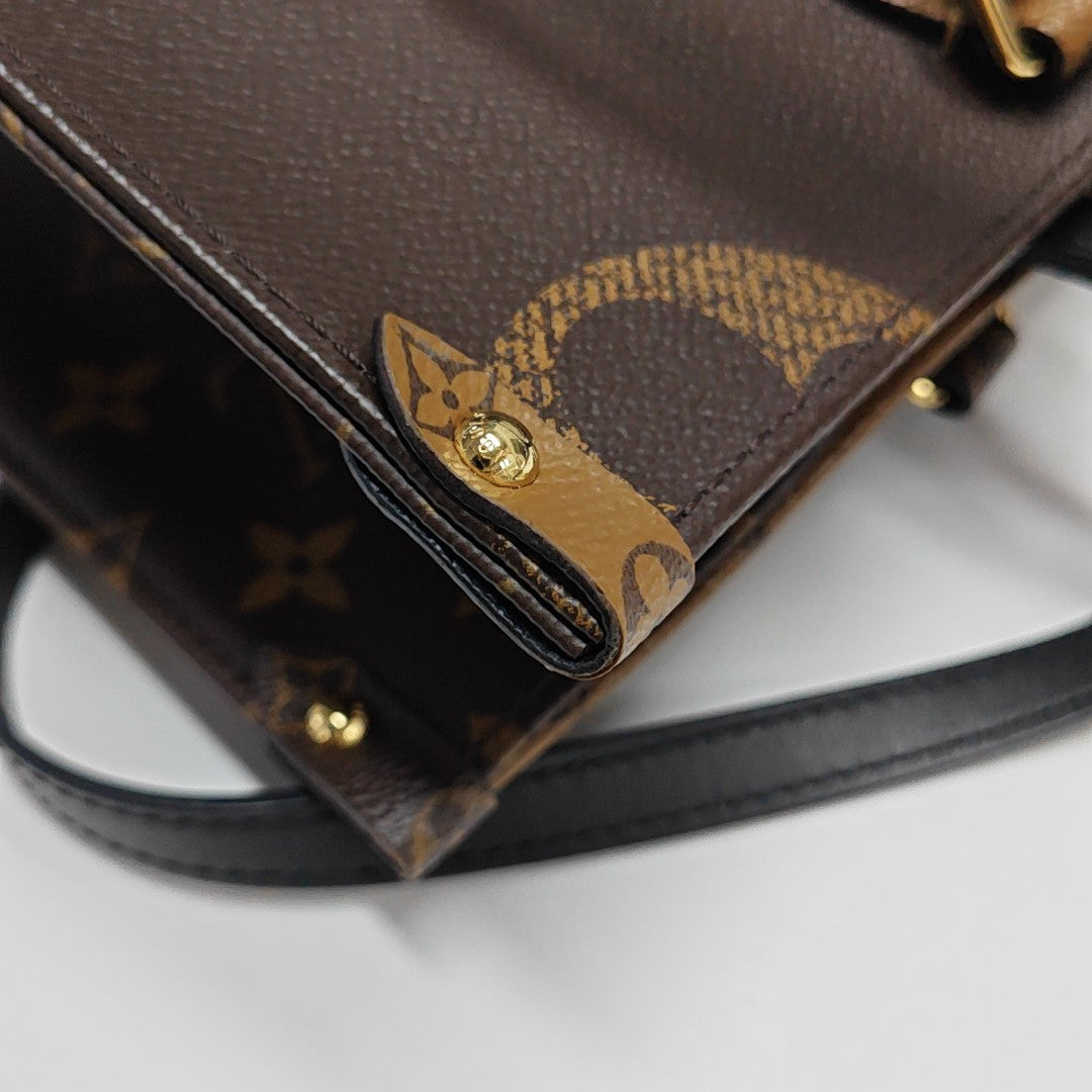 ONTHEGO MM Monogram Coated Canvas Brown