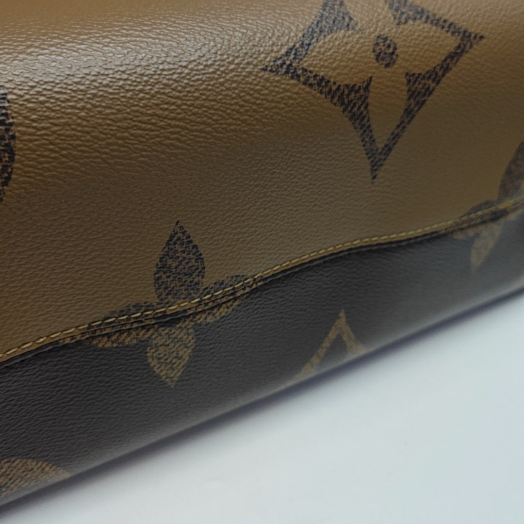 ONTHEGO MM Monogram Coated Canvas Brown