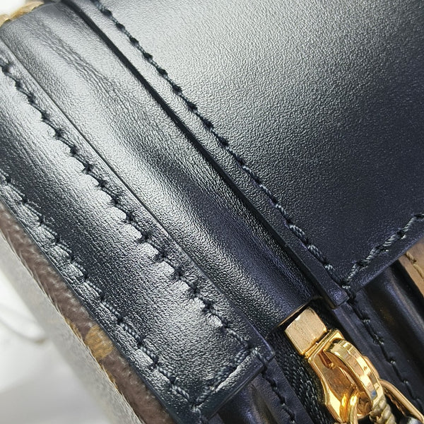 CANNES PM Monogram Coated Canvas Brown