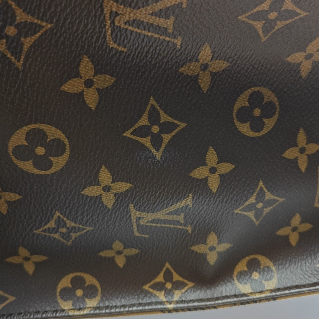 ONTHEGO GM Monogram Coated Canvas Brown