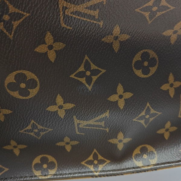 ONTHEGO GM Monogram Coated Canvas Brown