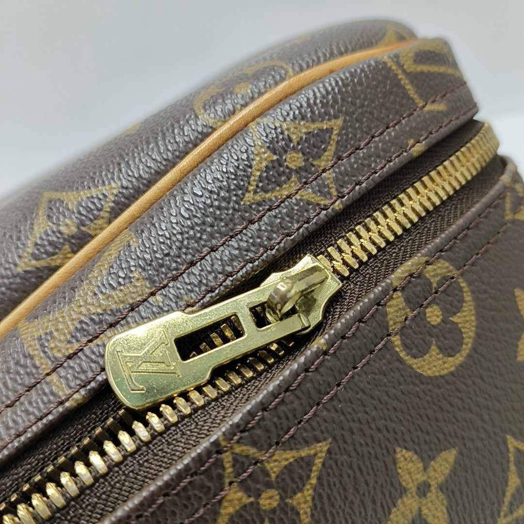 EXCURSION Monogram Coated Canvas Brown