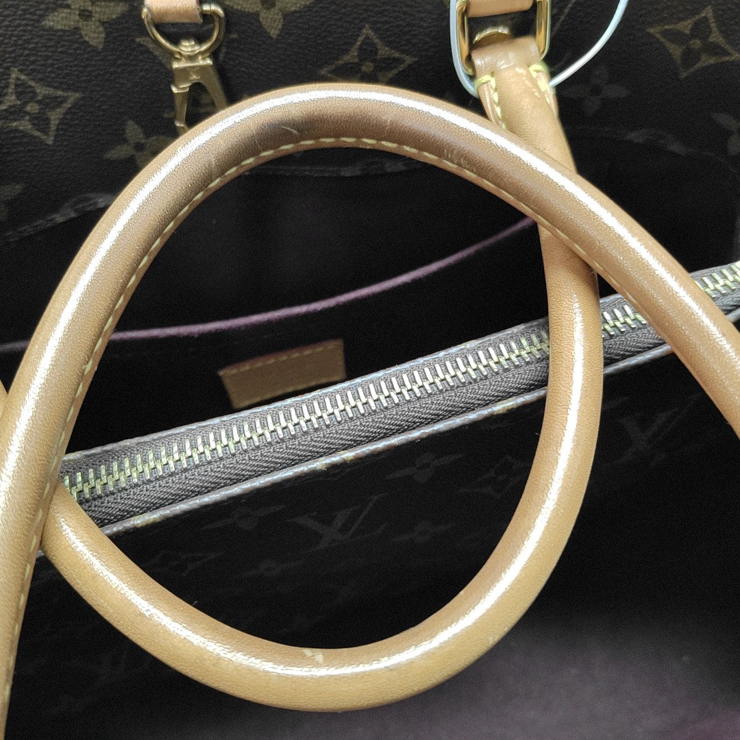 MONTAIGNE GM Monogram Coated Canvas Brown