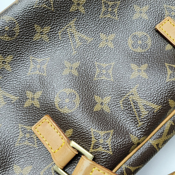 CITE MM Monogram Coated Canvas Brown