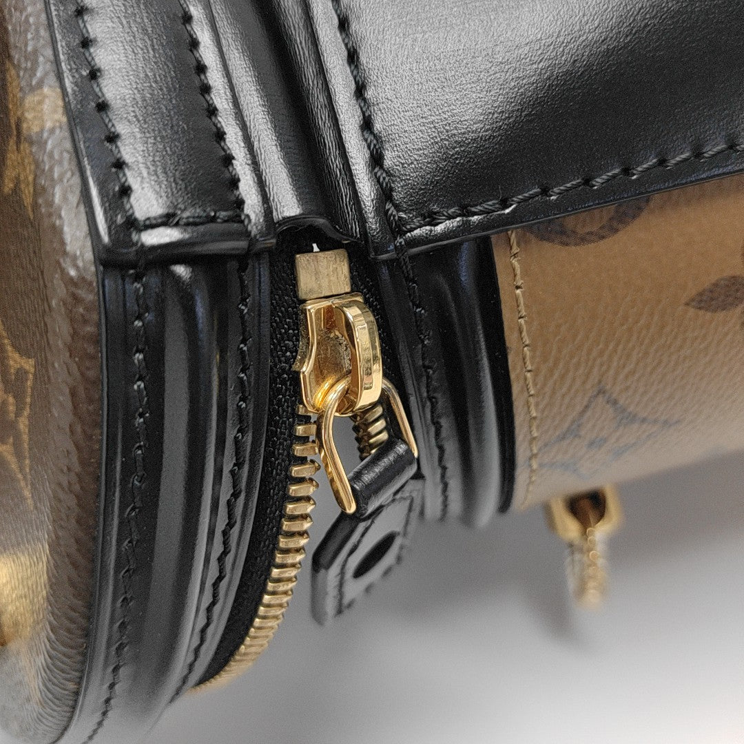 CANNES PM Monogram Coated Canvas Brown