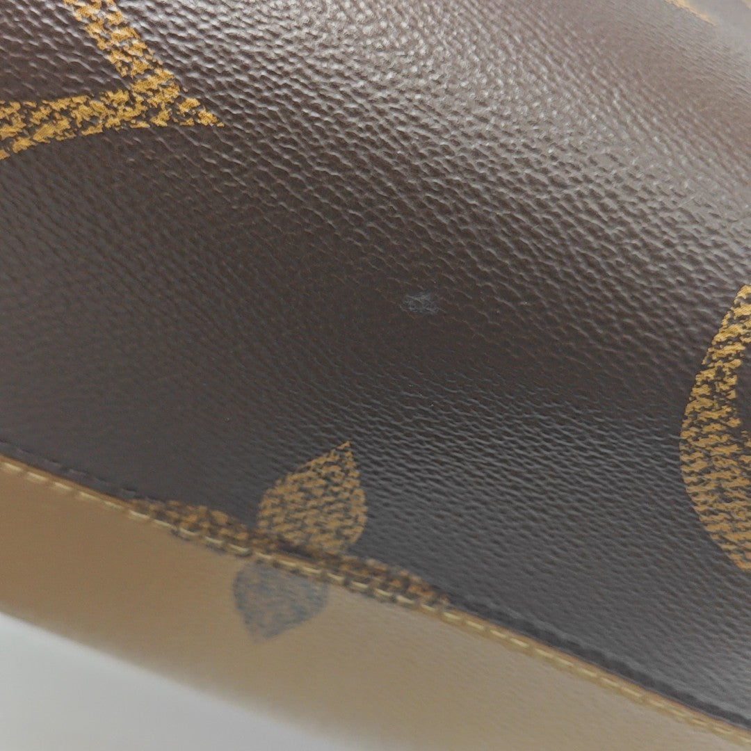 ONTHEGO MM Lona Monogram Revestida Marrón