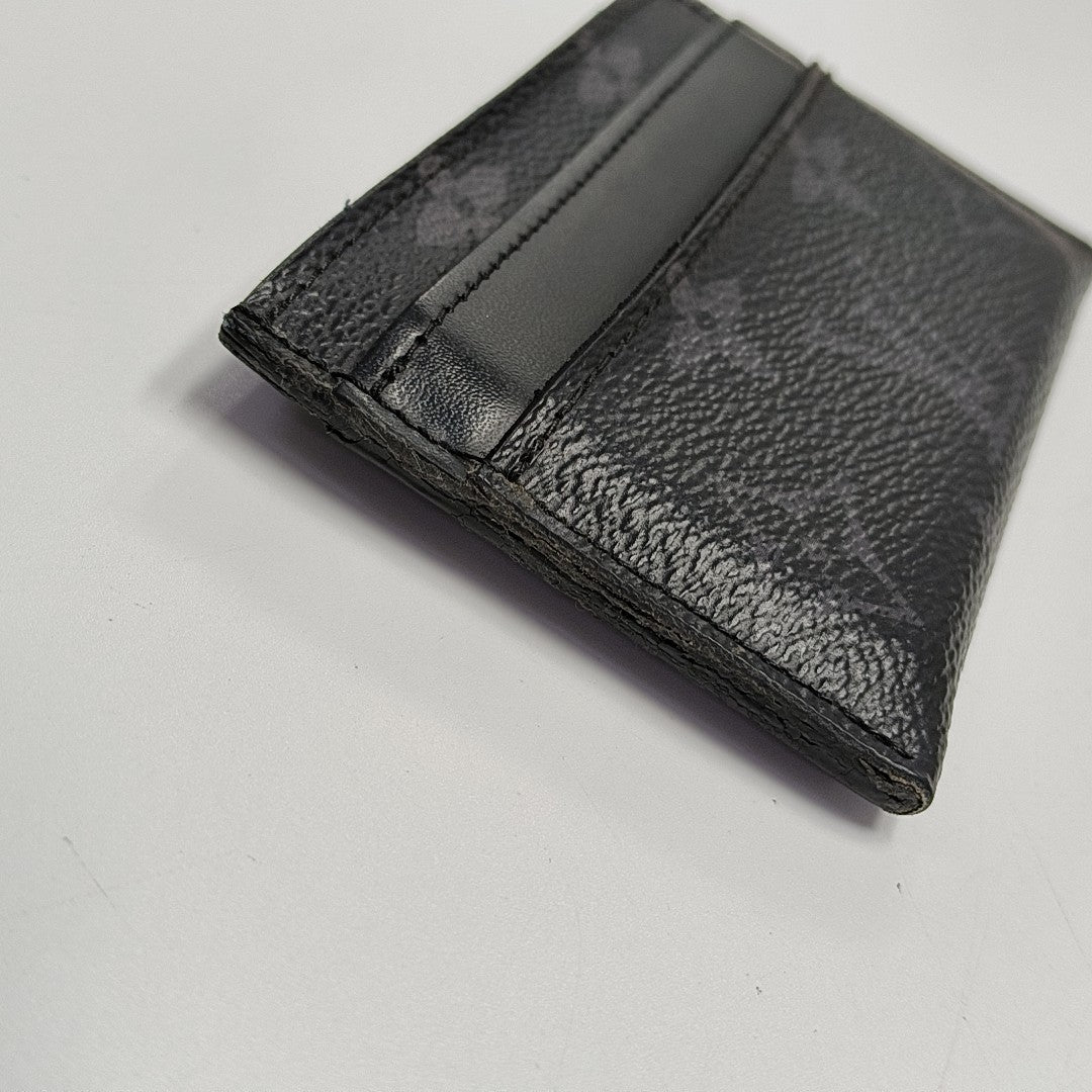 Monogram Coated Canvas Clutch Black