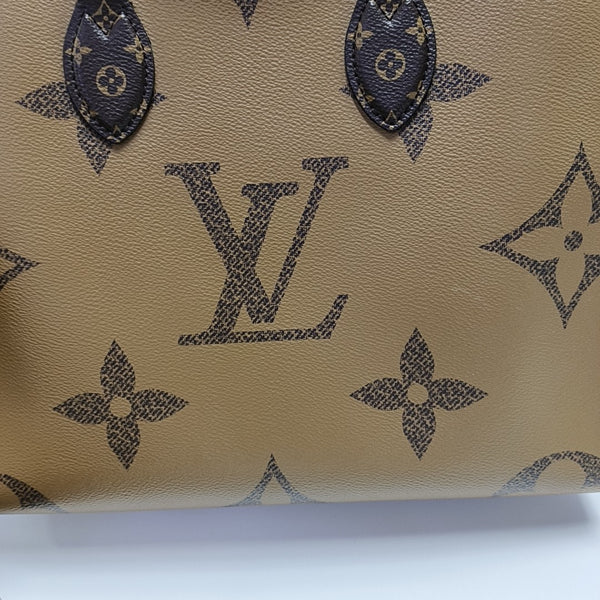 ONTHEGO MM Monogram Coated Canvas Brown