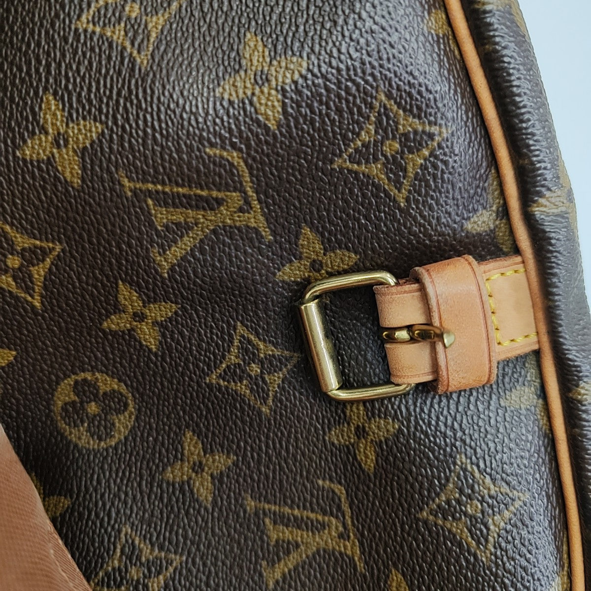 SAUMUR Monogram Coated Canvas Brown