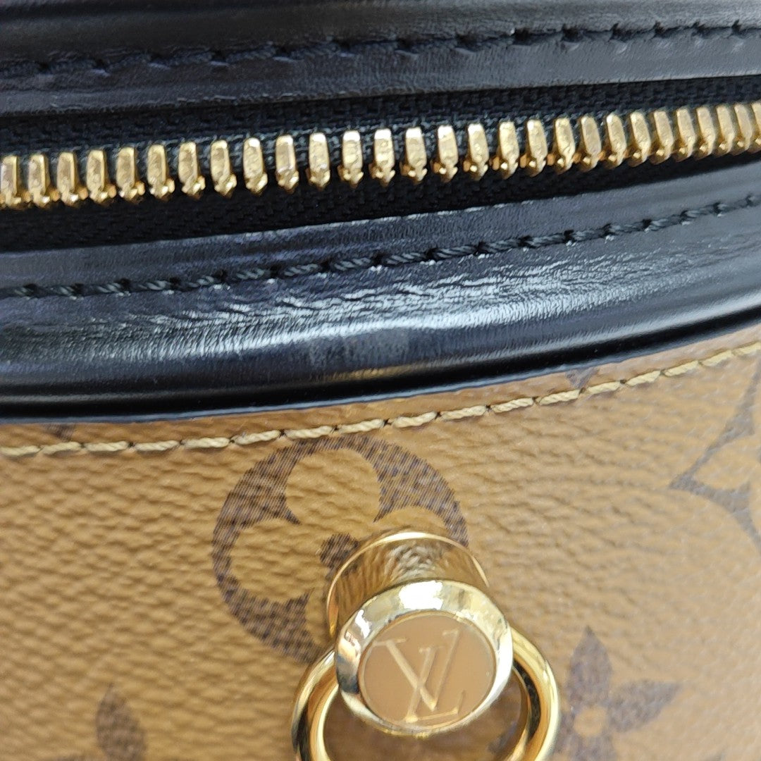 CANNES PM Monogram Coated Canvas Brown