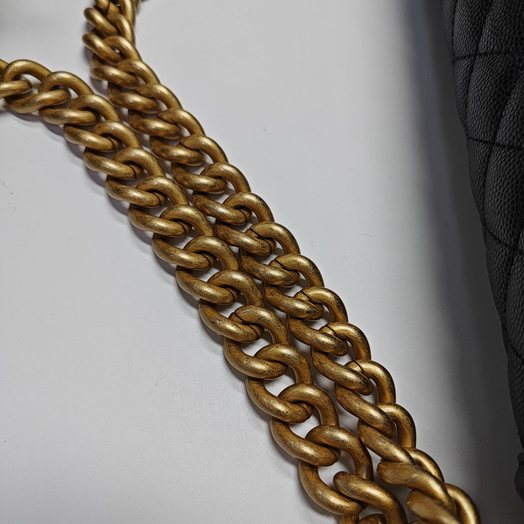 Authenticated pre-owned  BOY CHANEL Medium Quilted Grained Calfskin Black - Shoulder Bag at Looply