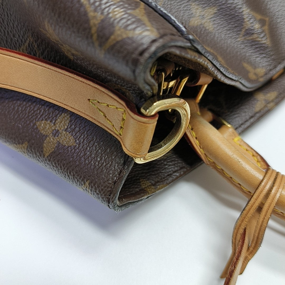 MONTAIGNE Monogram Coated Canvas Brown