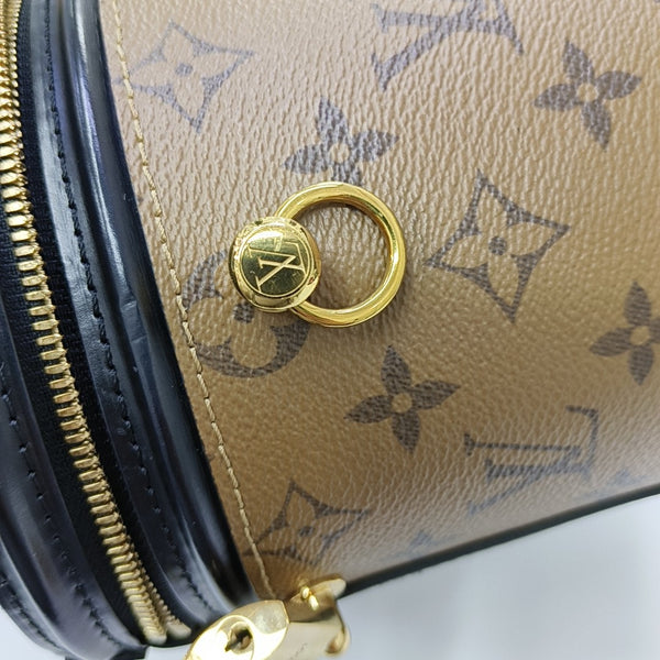 CANNES PM Monogram Coated Canvas Brown
