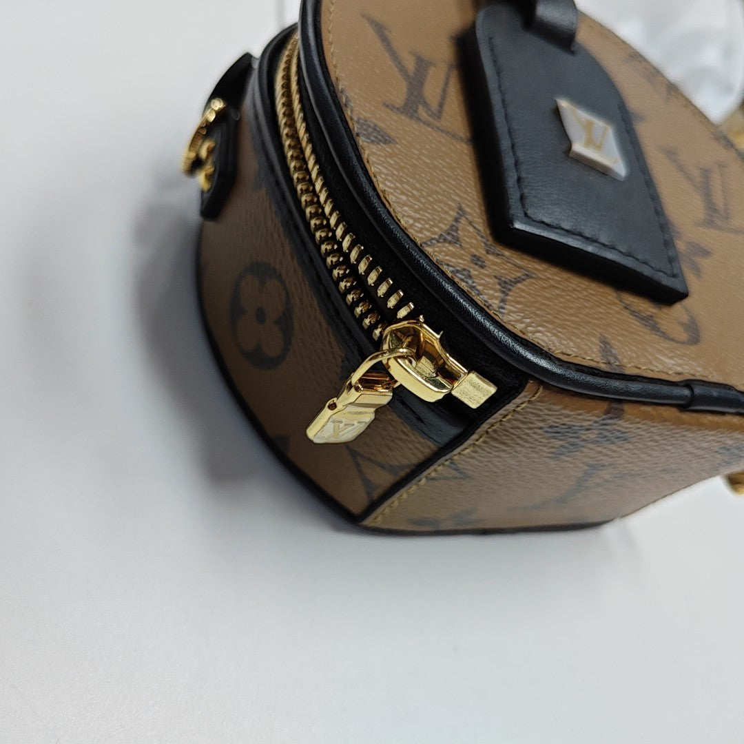 BOITE CHAPEAU Mini Monogram Coated Canvas Brown