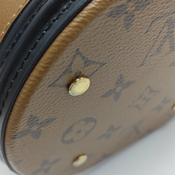 CANNES PM Monogram Coated Canvas Brown