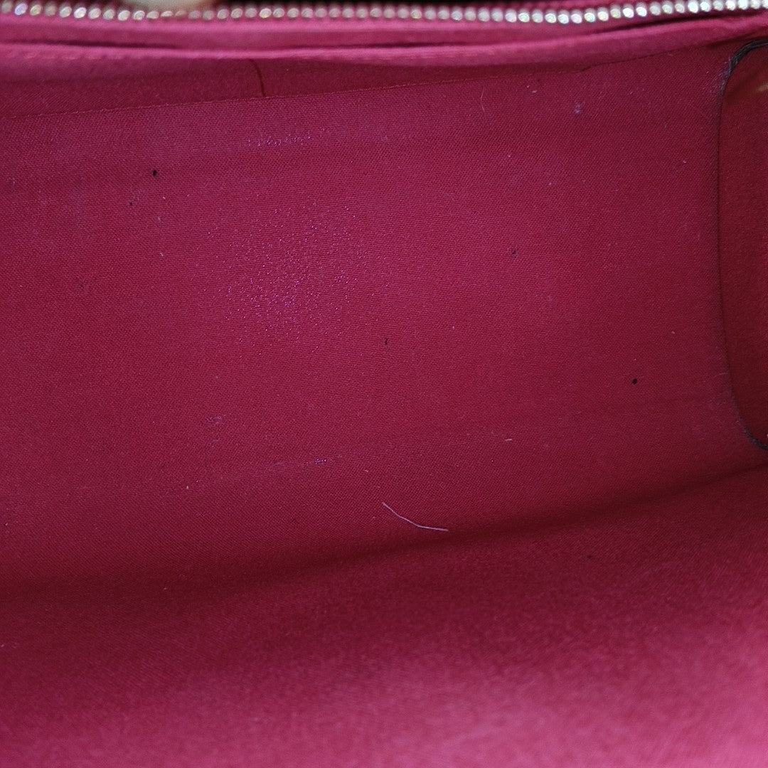 ONTHEGO MM Monogram Coated Canvas Brown