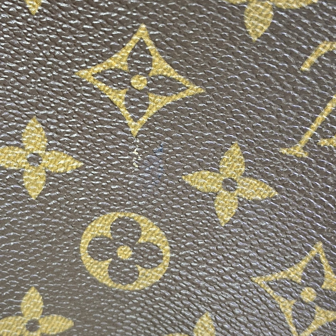 REPORTER PM Monogram Coated Canvas Brown