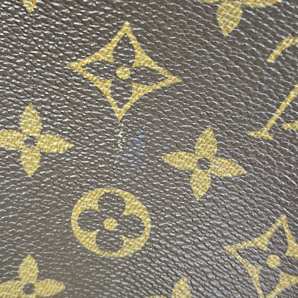 REPORTER PM Monogram Coated Canvas Brown