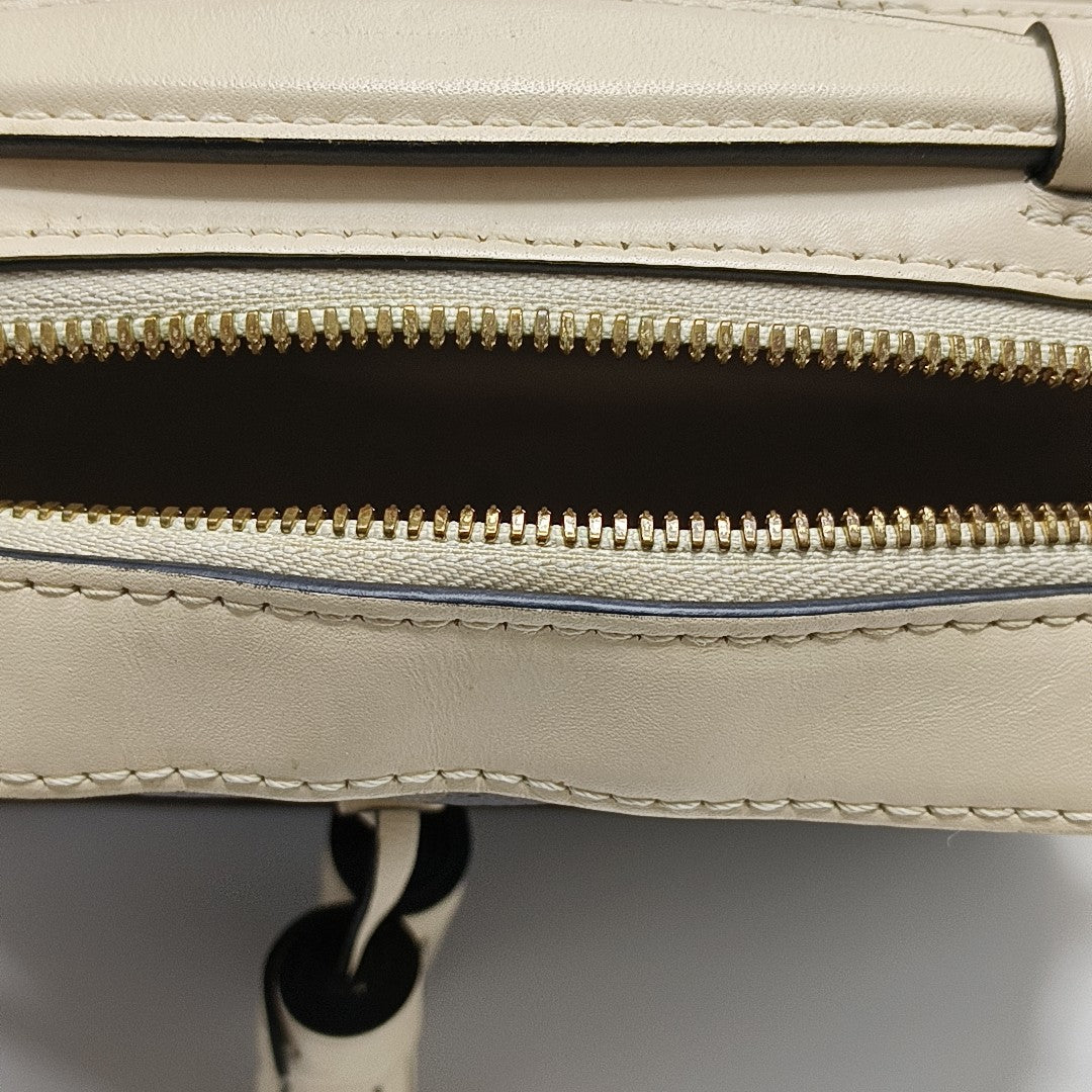SAINTONGE Monogram Coated Canvas Brown