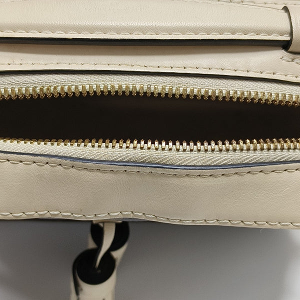 SAINTONGE Monogram Coated Canvas Brown