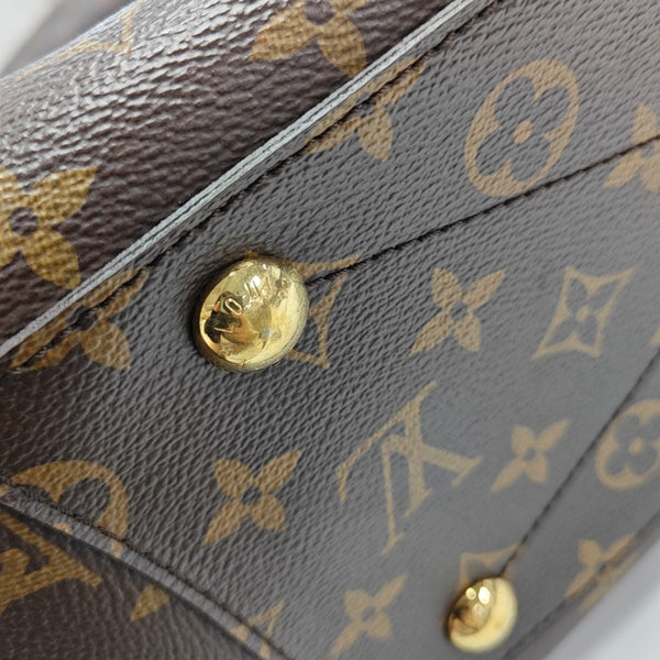 MONTAIGNE GM Monogram Coated Canvas Brown