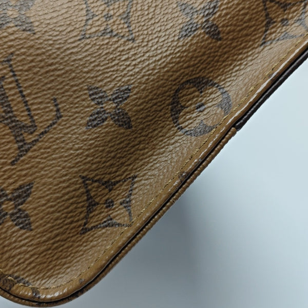 ONTHEGO MM Monogram Coated Canvas Brown