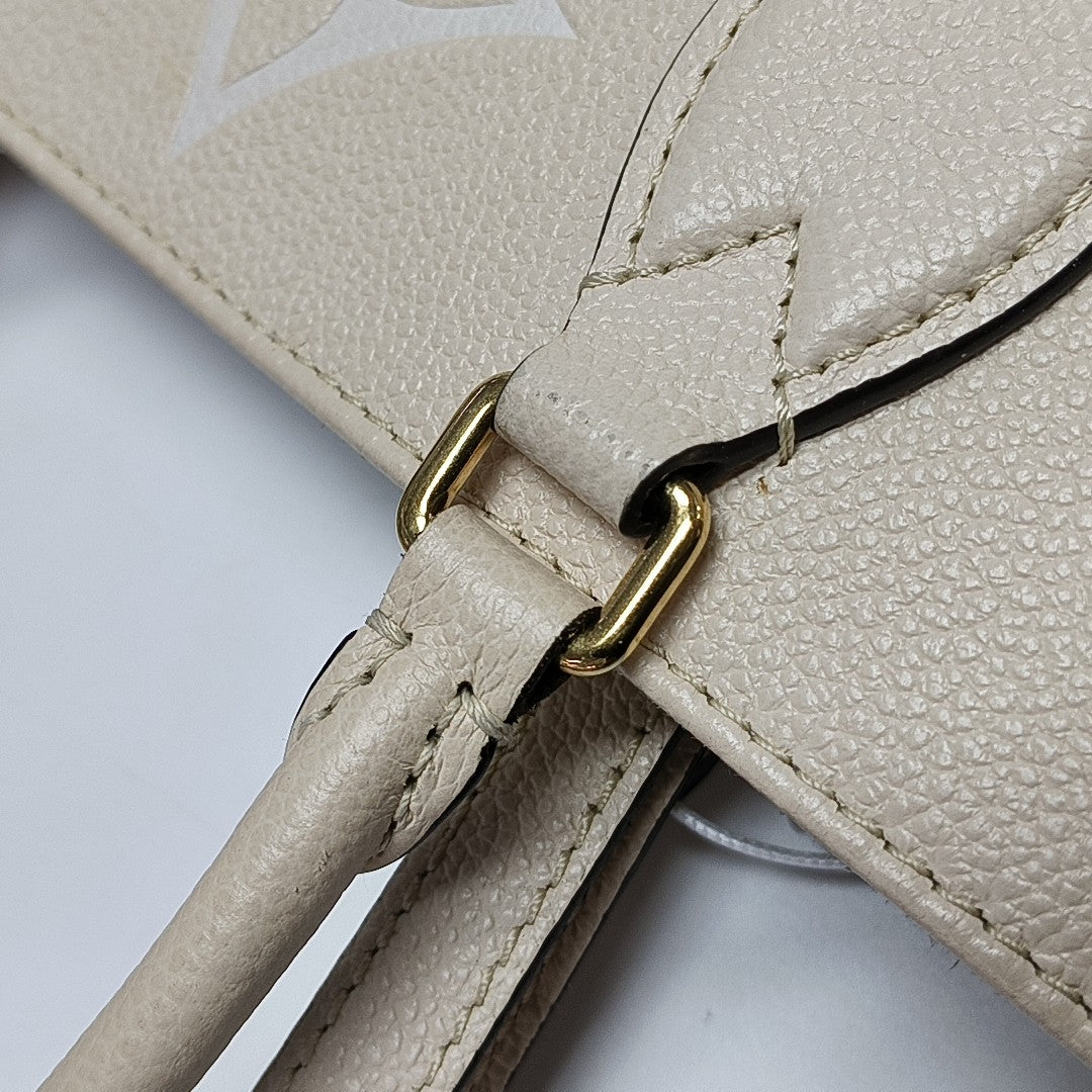 ONTHEGO MM Monogram Calfskin Beige
