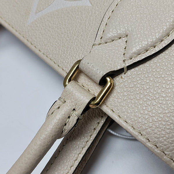 ONTHEGO MM Monogram Calfskin Beige