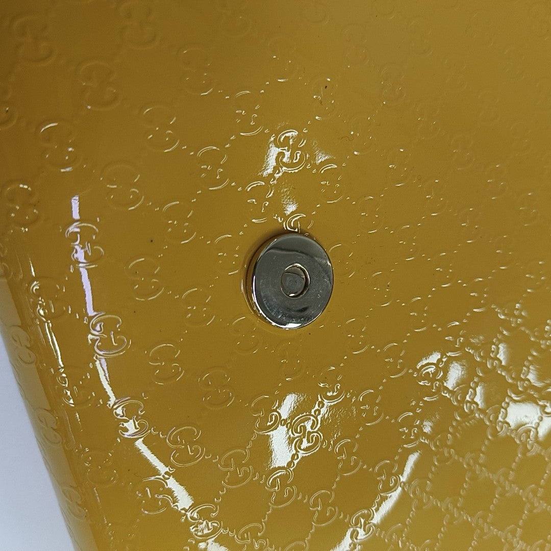 Monogram Patent Leather Clutch Yellow