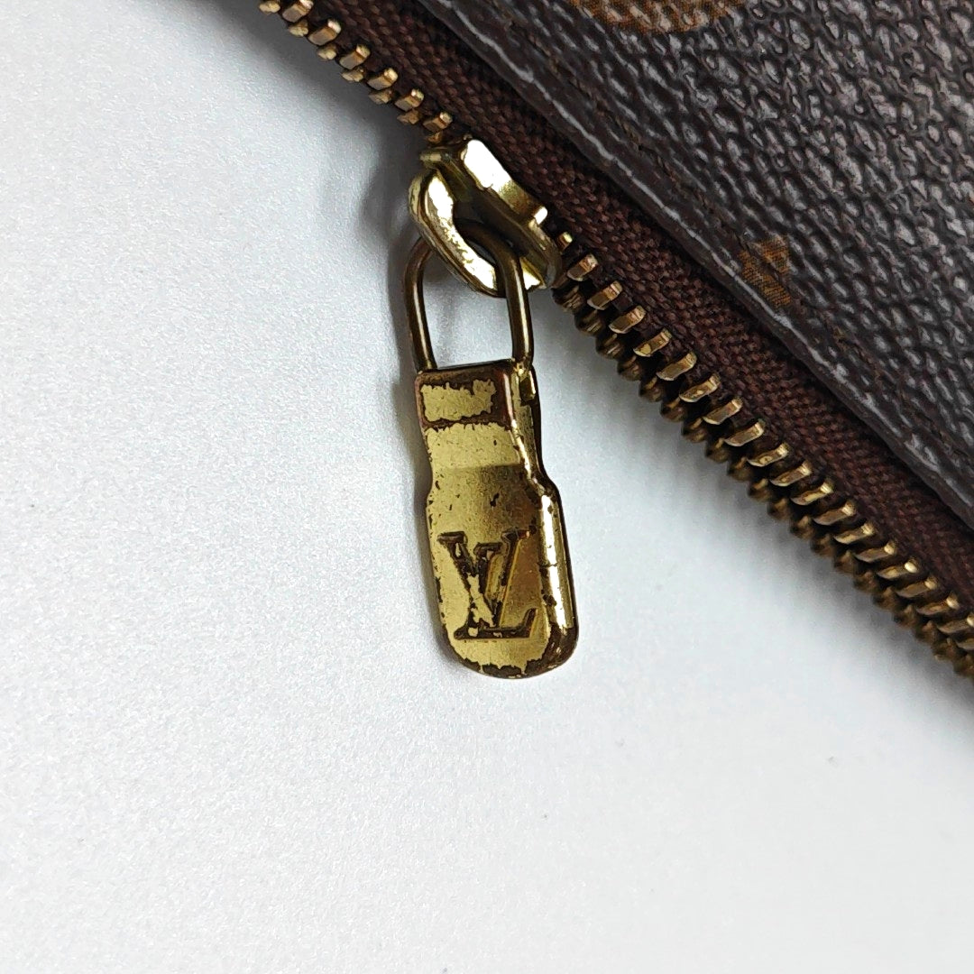 Authenticated pre-owned  ACCESSOIRES Mini Monogram Coated Canvas Brown - Top Handle Bag at Looply