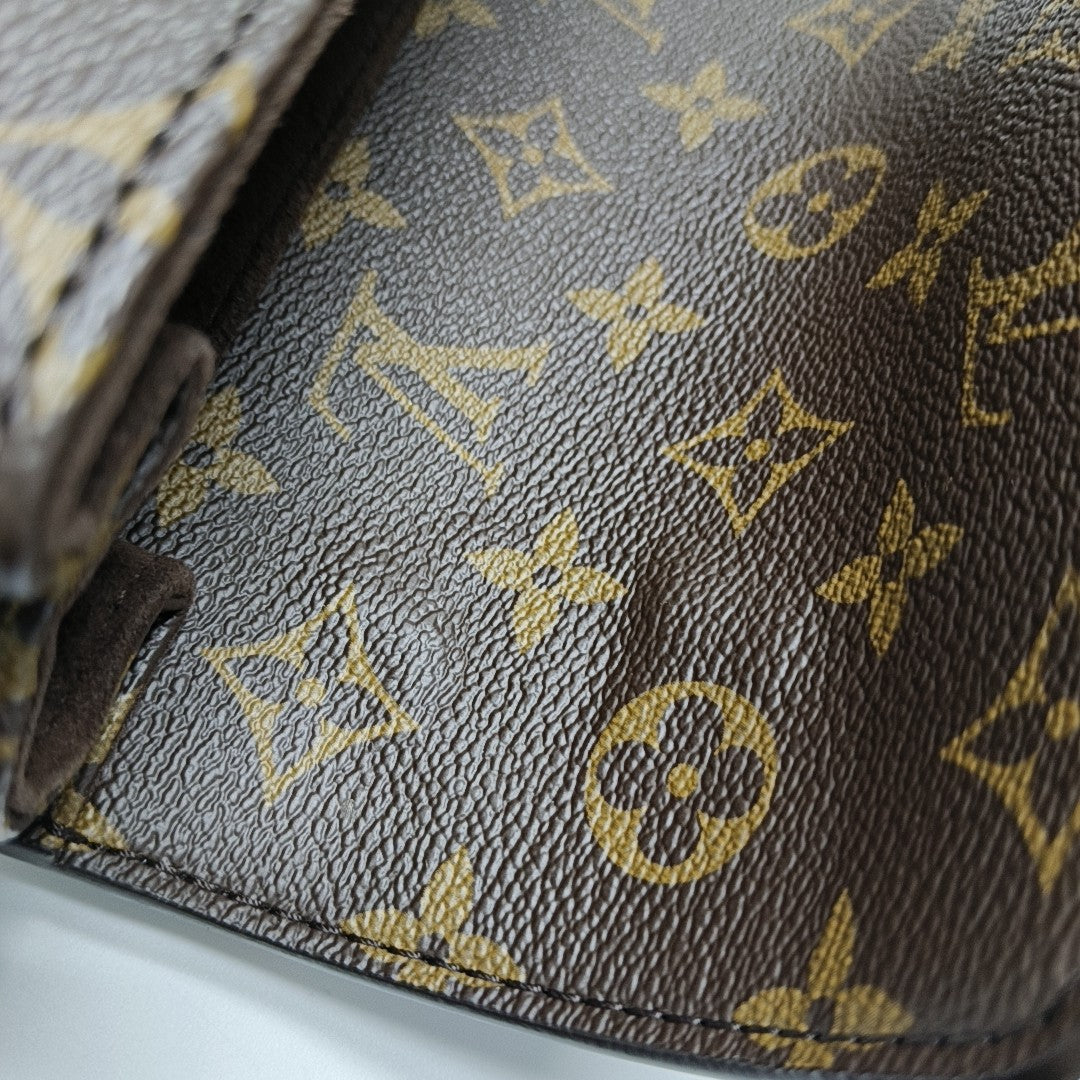 MÉTIS EAST WEST Monogram Coated Canvas Brown
