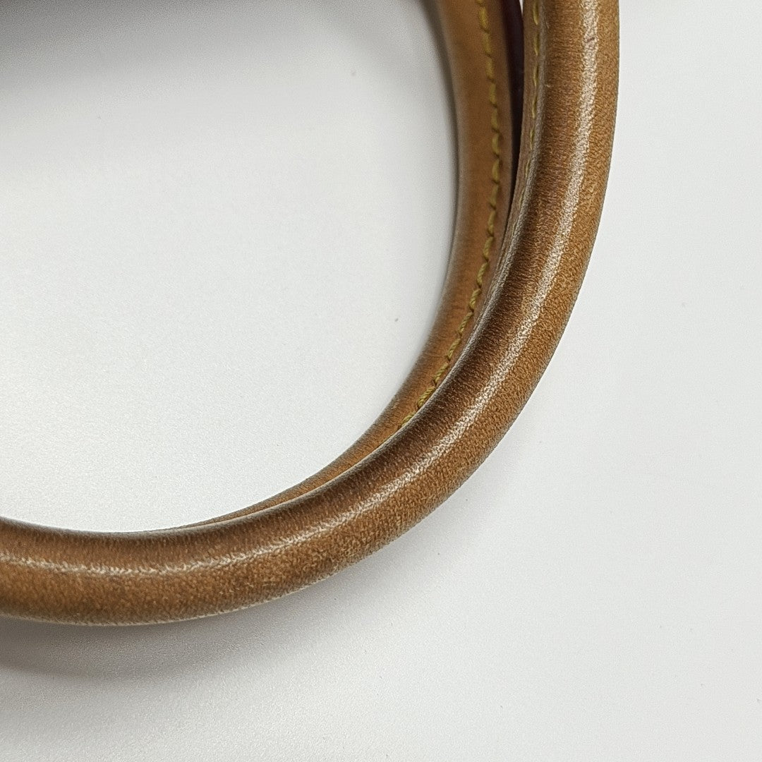 MONTAIGNE Monogram Coated Canvas Brown