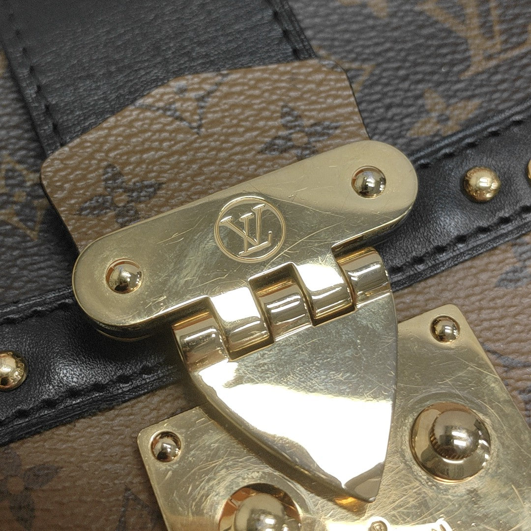 TRUNK Monogram Coated Canvas Brown