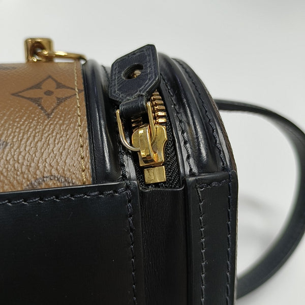CANNES PM Monogram Coated Canvas Brown