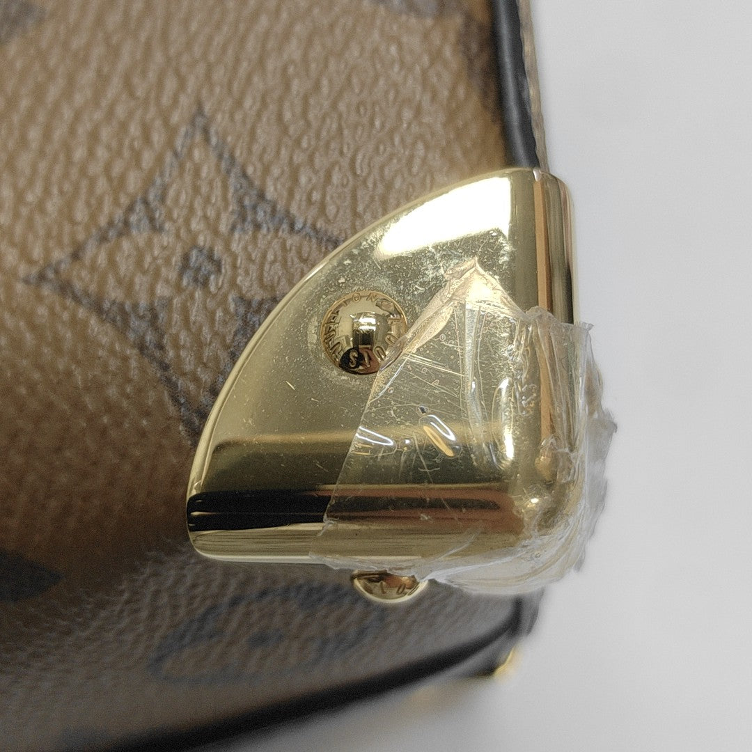 NOÉ PURSE LV CHARMS Monogram Coated Canvas Brown