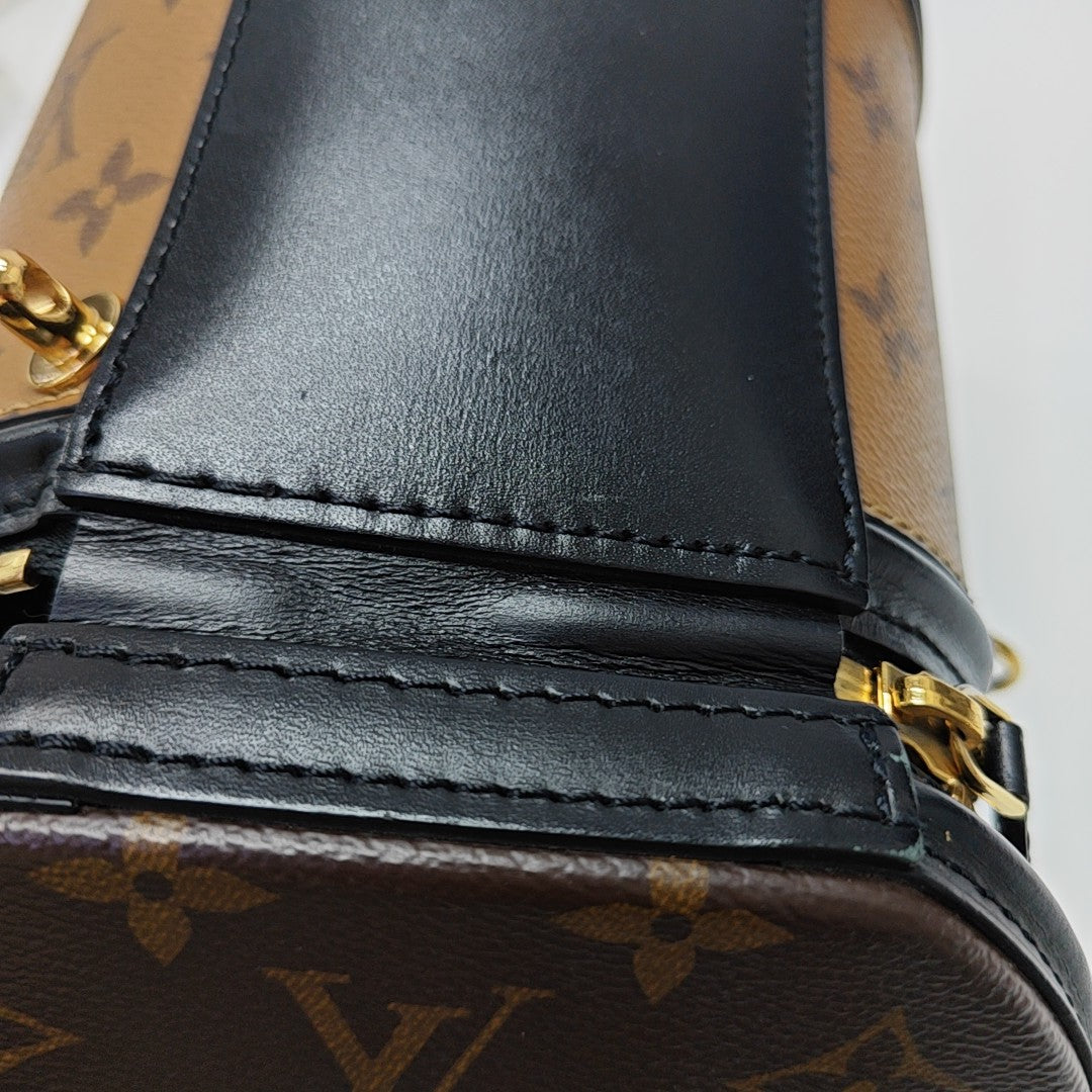 CANNES PM Monogram Coated Canvas Brown