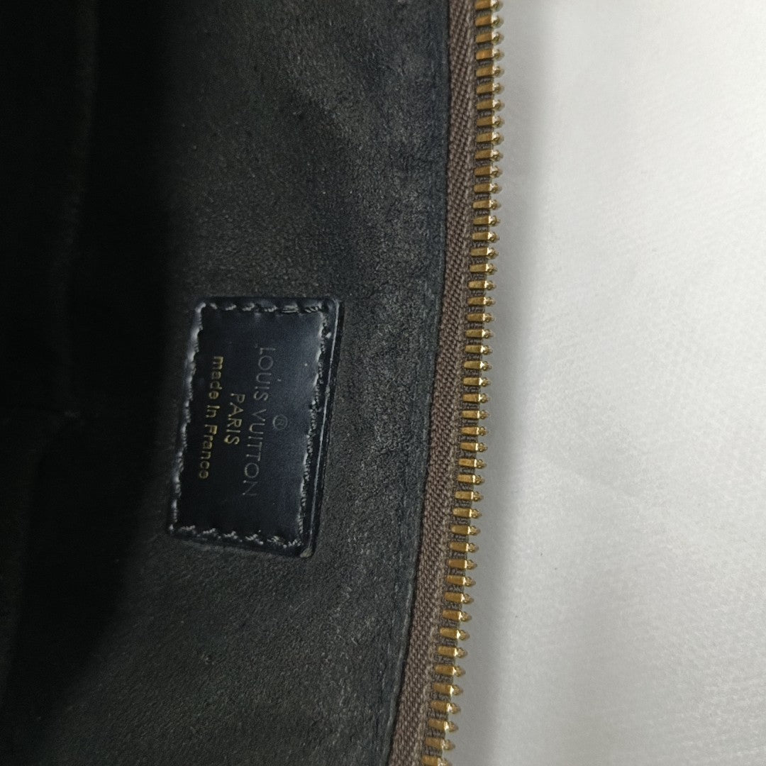 ESTRELA Monogram Coated Canvas Brown
