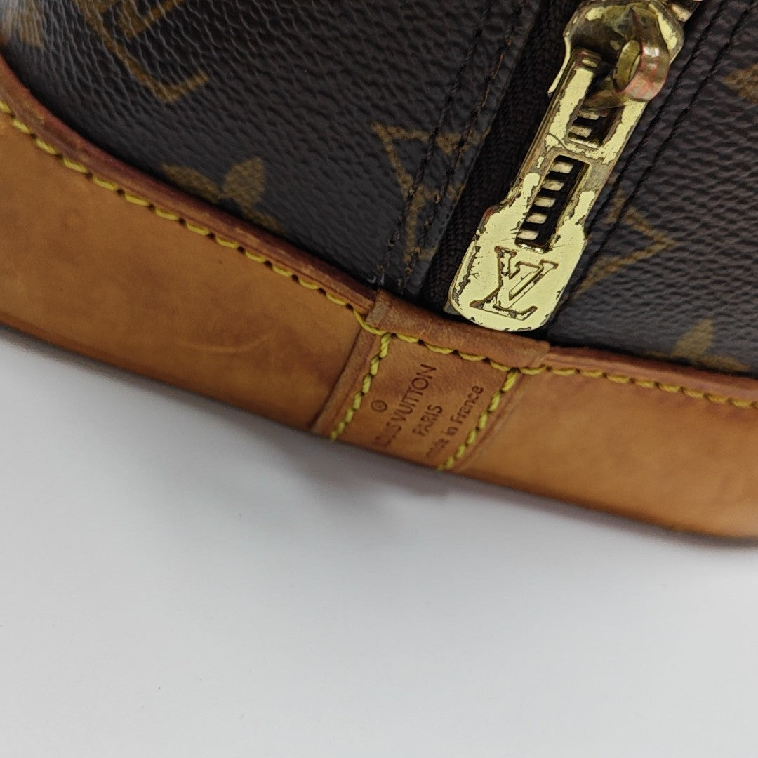 ALMA PM Monogram Coated Canvas Brown