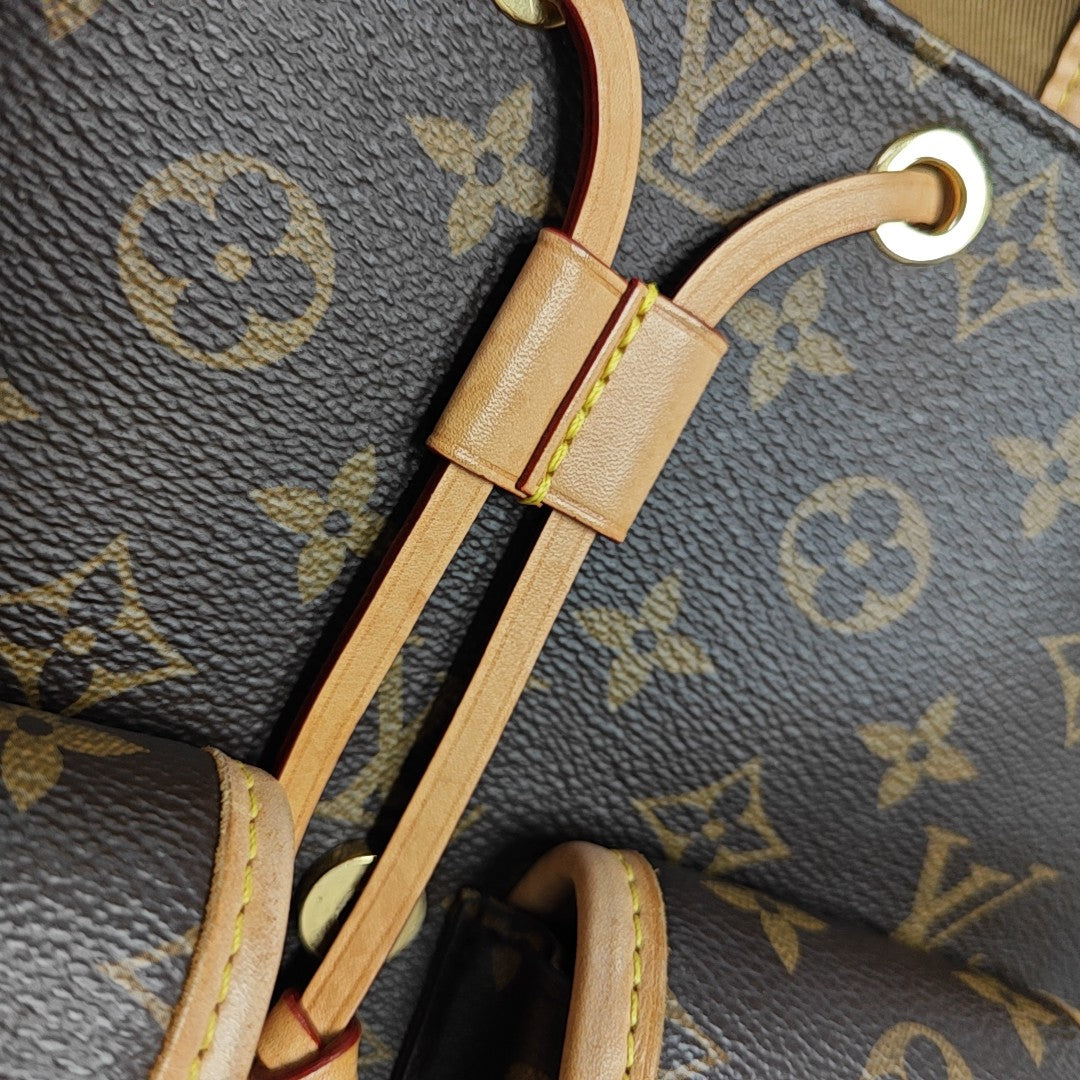EXCURSION PM Monogram Coated Canvas Brown