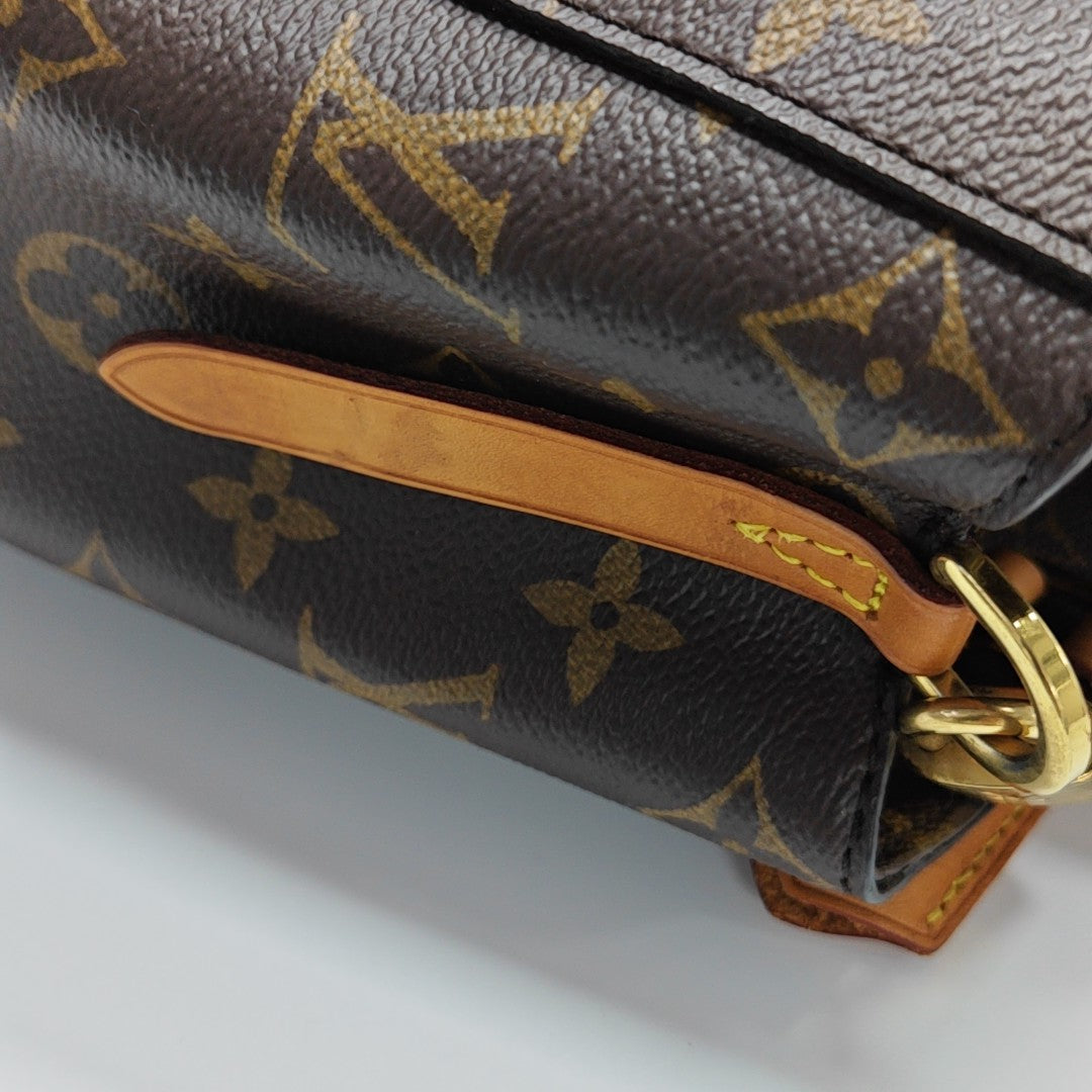 MONTAIGNE BB Monogram Coated Canvas Brown