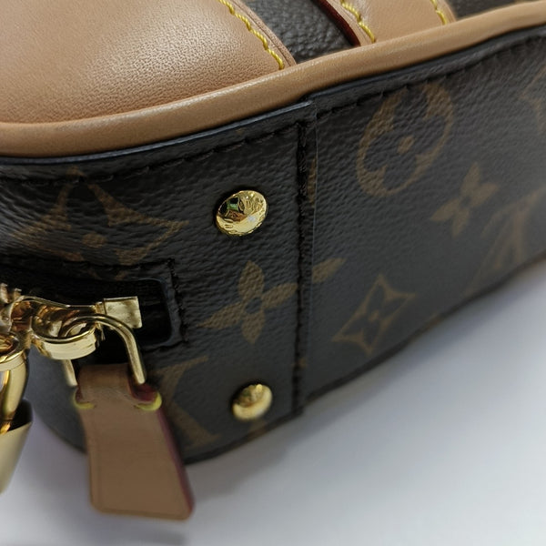 LUGGAGE Monogram Coated Canvas Brown
