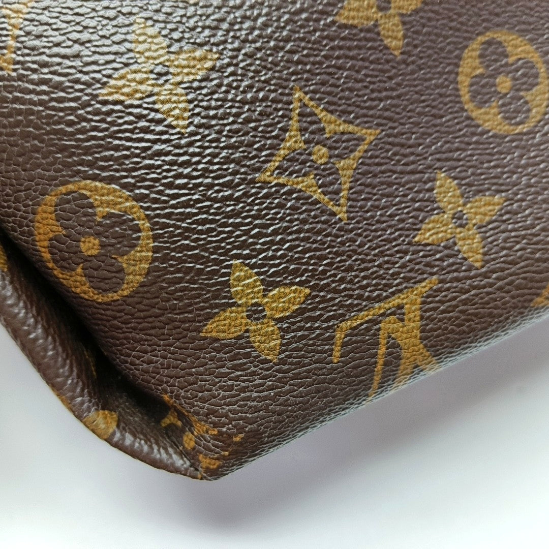 Authenticated pre-owned  PALLAS Monogram Coated Canvas Brown - Clutch at Looply