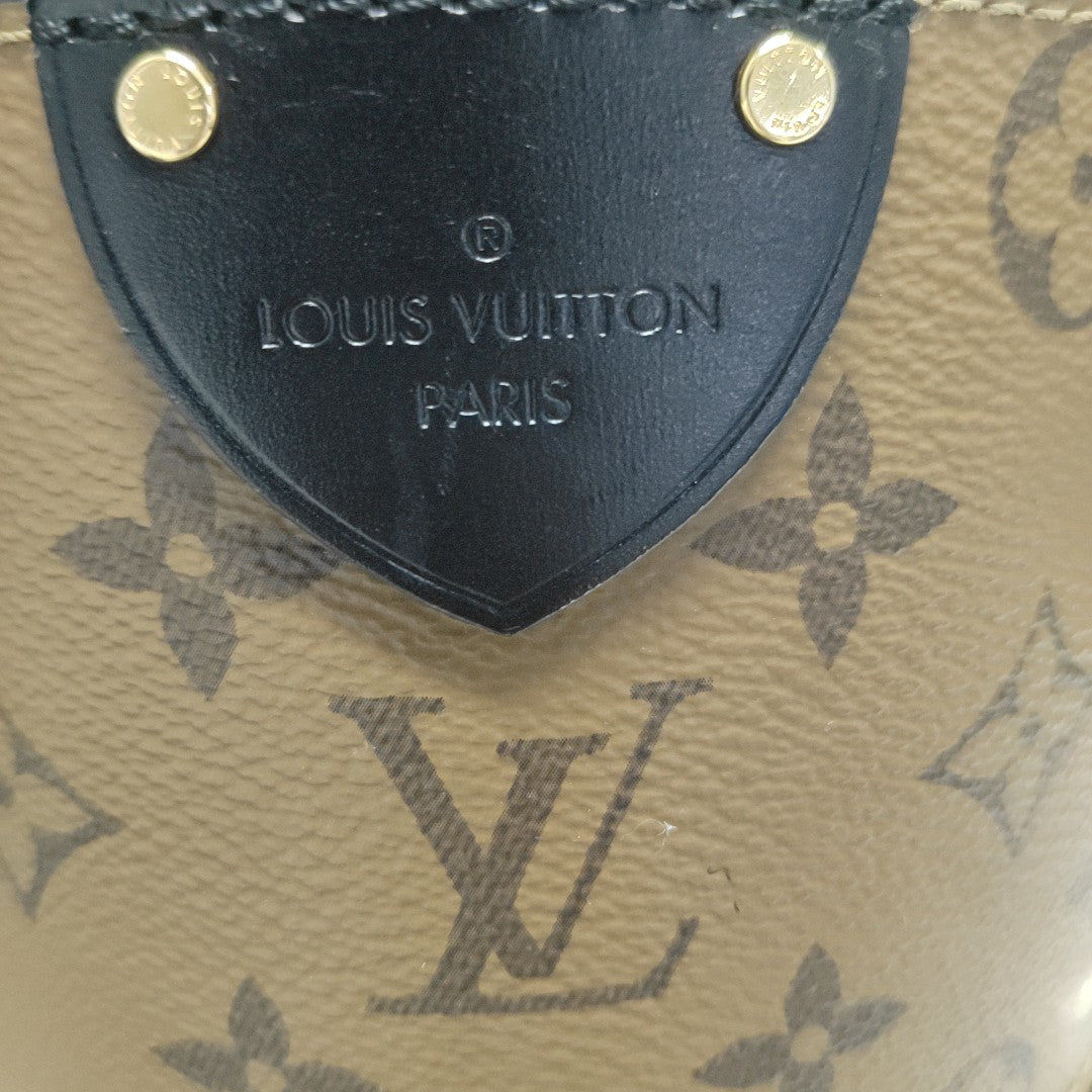 CANNES PM Monogram Coated Canvas Brown