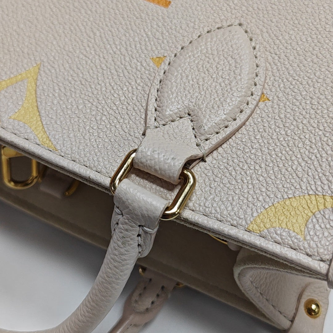 ONTHEGO PM Monogram Calfskin Beige