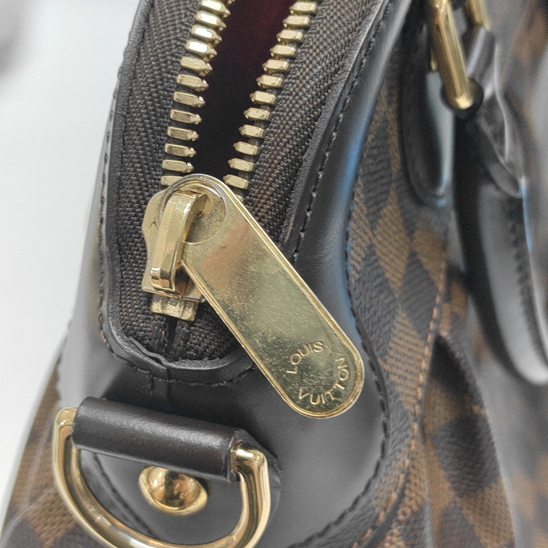 TREVI PM Damier Ebene Coated Canvas Brown