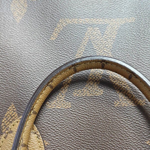 ONTHEGO MM Monogram Coated Canvas Brown