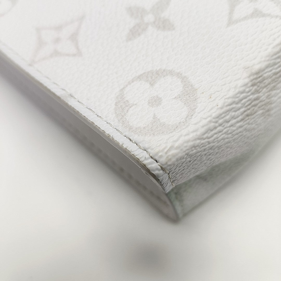Pochette Voyag MM Monogram Coated Canvas White