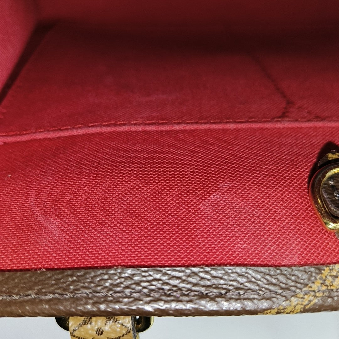 ONTHEGO PM Monogram Coated Canvas Brown