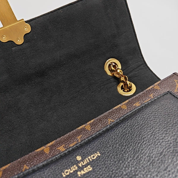 VICTOIRE Monogram Coated Canvas Brown