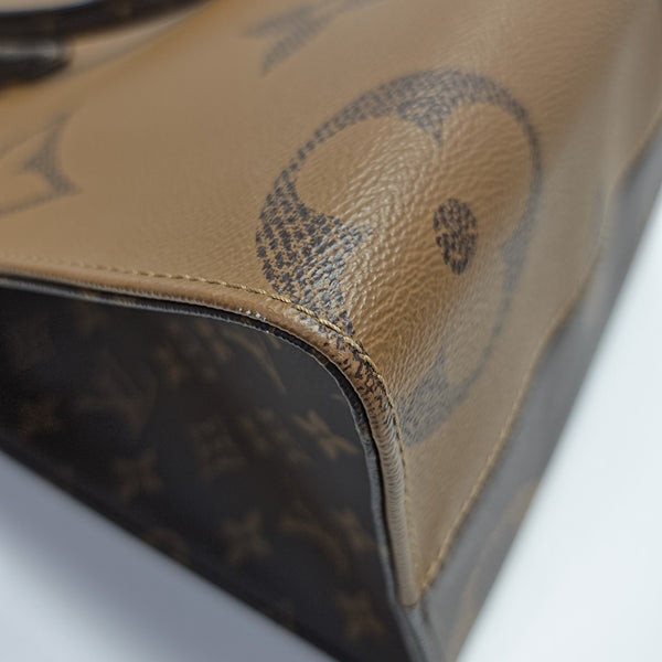 ONTHEGO MM Monogram Coated Canvas Brown